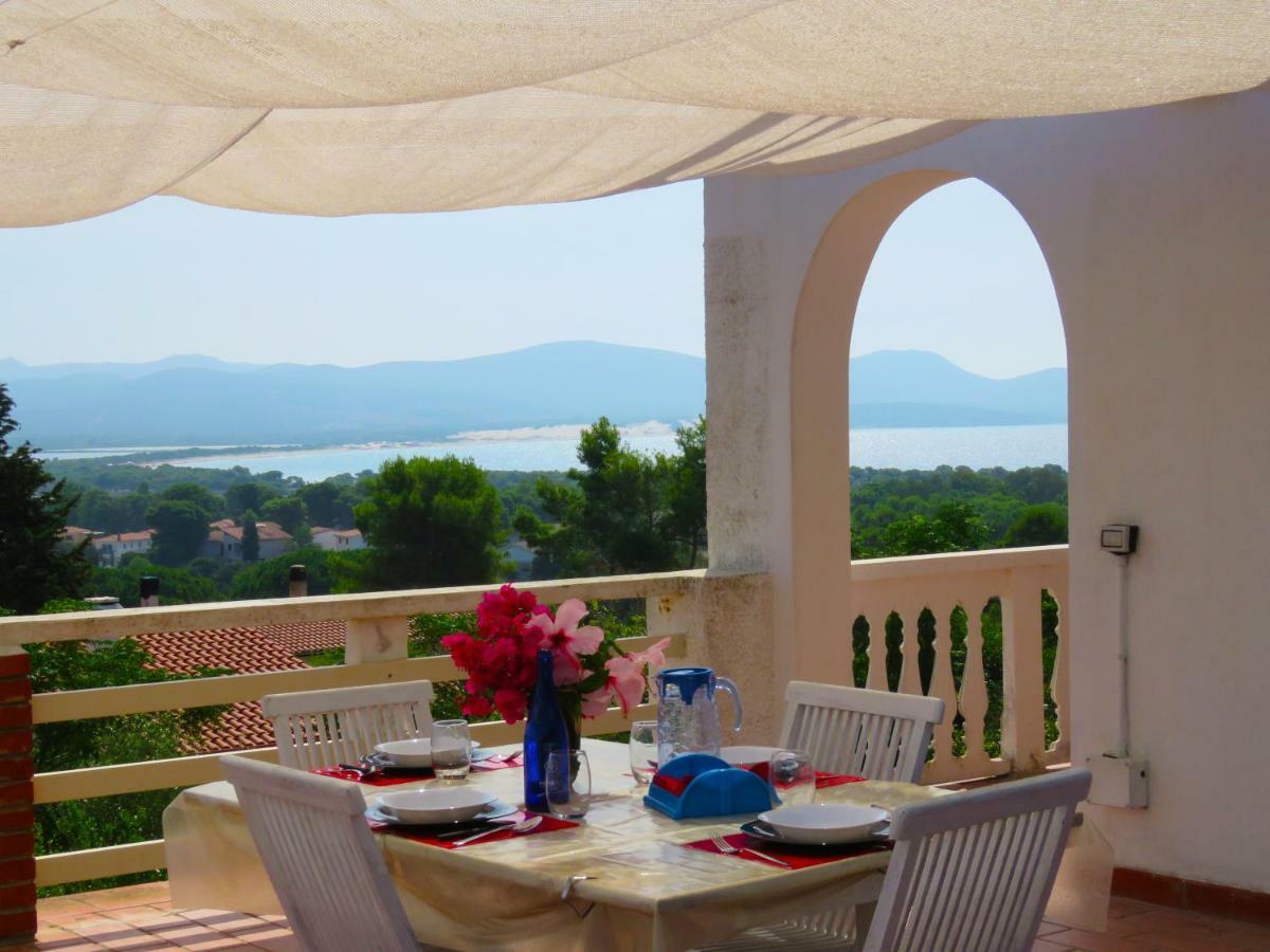 Panohome Porto Pino Extérieur photo